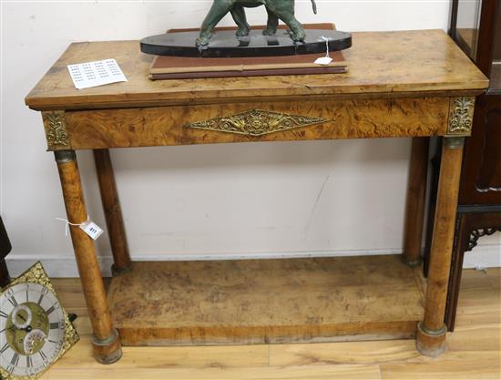 A 19th century burr elm console table with brass mounts W.113cm.